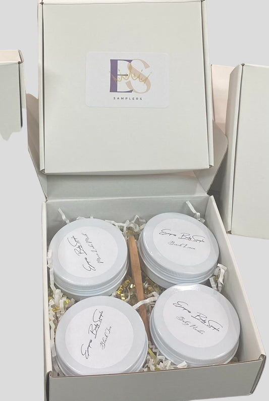 4 candle samples in white box