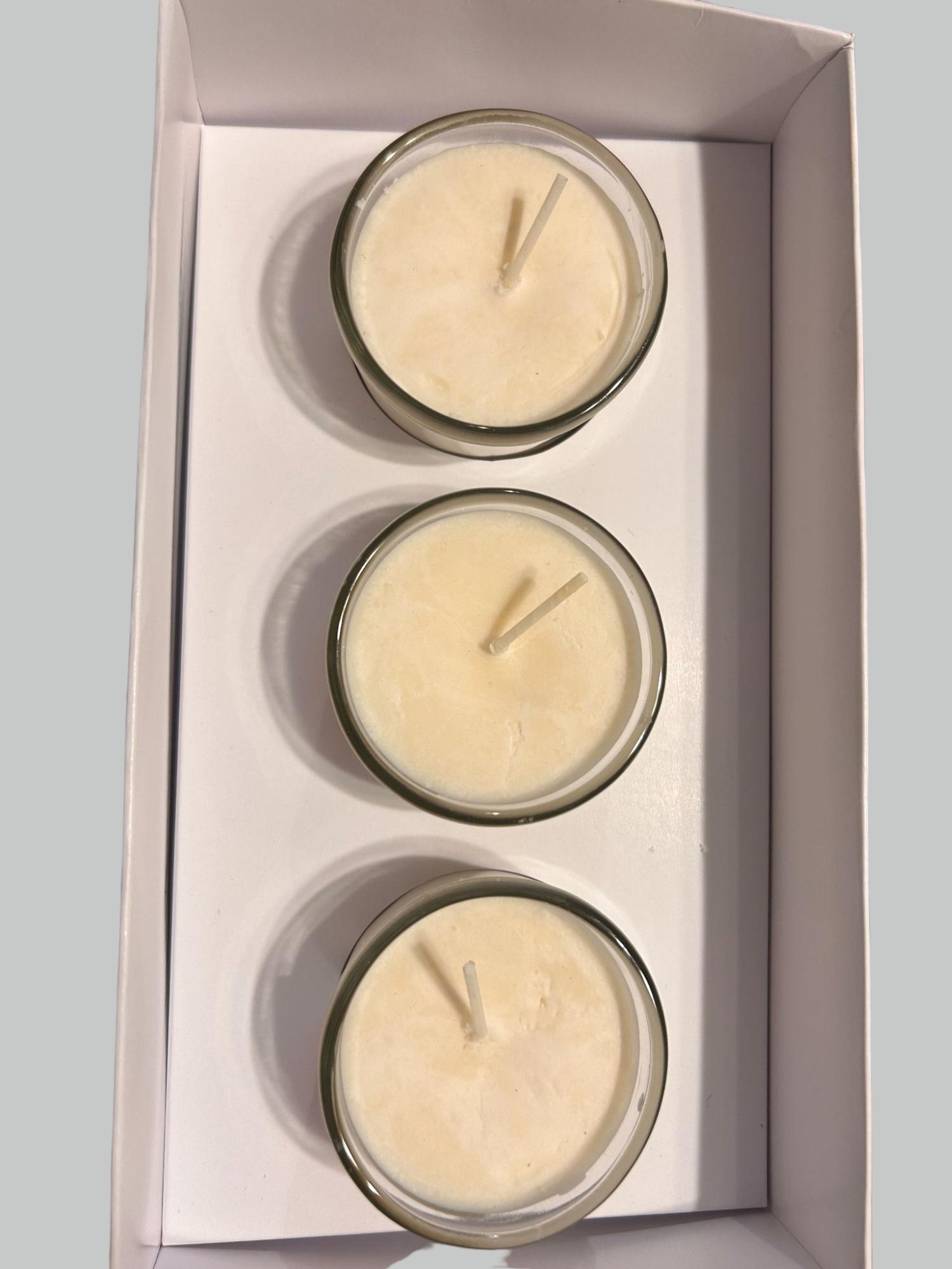 Three White Votive Candles