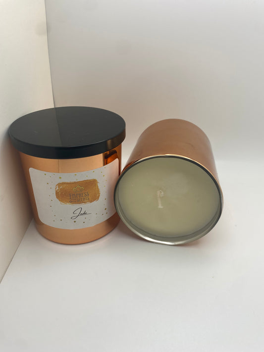 Two Small Copper-Colored Candle Jars with White Candle Wax